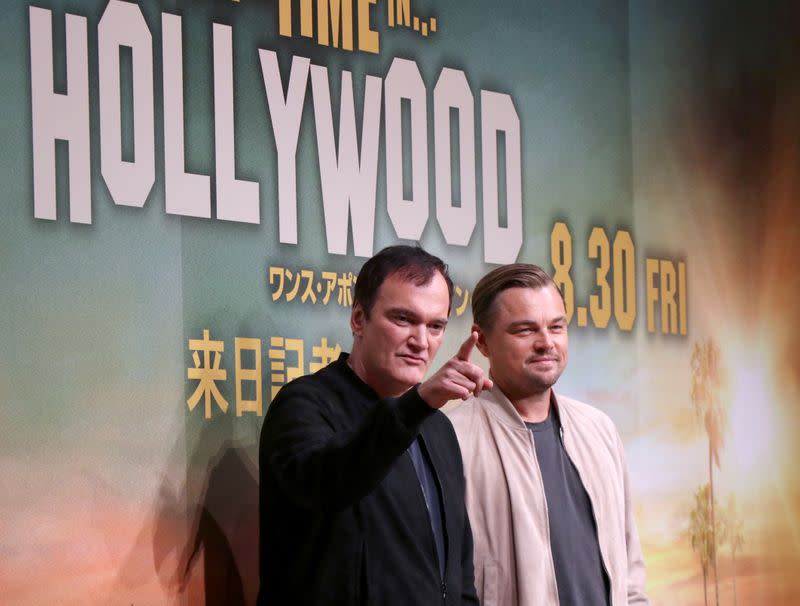 Actor Leonardo DiCaprio and director Quentin Tarantino pose for a photo during a news conference for the film 'Once Upon a Time In Hollywood' in Tokyo