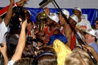 Michael Jordan and the Bulls celebrate after beating the Suns, 99-98, in Game 6 of the 1993 NBA Finals. (Getty Images)