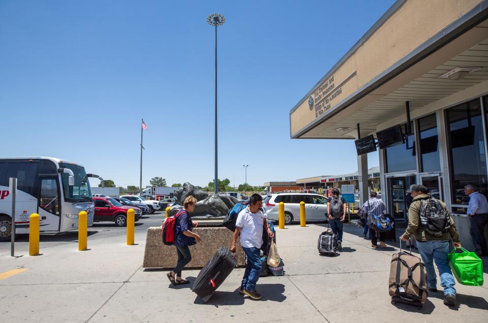 People enter the building heading north at the Bridge of the Americas port of entry at the 50-year-old land port of entry administrative building in July 2023.