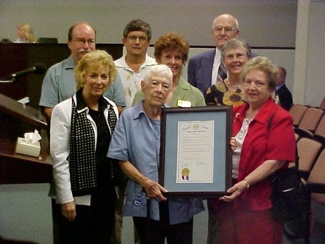 In May 2006, the Brevard County Commission designated Weona Cleveland as honorary county historian. In back row, from left: Jim Culberson, Ed Vosatka, Roz Foster, David Paterno and Sandee Natowich (all of the Brevard County Historical Commission). Front row: Commission Chair Helen Voltz, Cleveland and Ada Parrish of the Historical Commission.