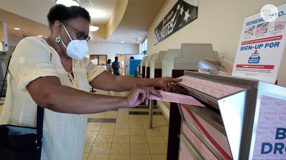 Cheryl Tyler casts her ballot at the Sacramento County Registrar of Voters in Sacramento, Calif., Friday, June 3, 2022.