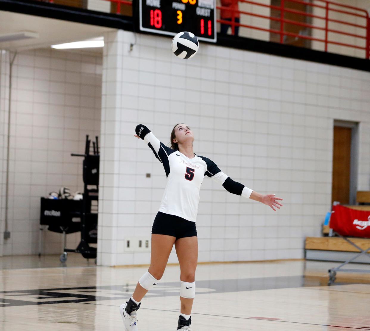 NorthWood senior Karis Bennett goes to serve the ball during a match against Tippecanoe Valley Wednesday, Sept. 6, 2023, at NorthWood High School in Nappanee.