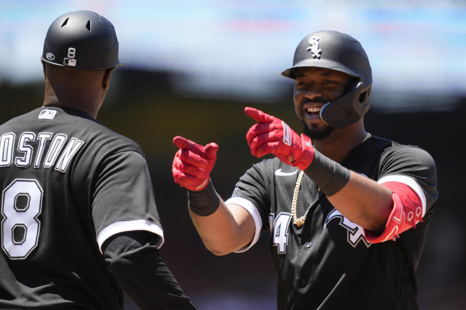 Chicago White Sox's Eloy Jimenez (74) celebrates after a single during the third inning of a baseball game against the Los Angeles Angels in Anaheim, Calif., Thursday, June 29, 2023. Zach Remillard and Tim Anderson scored. (AP Photo/Ashley Landis)