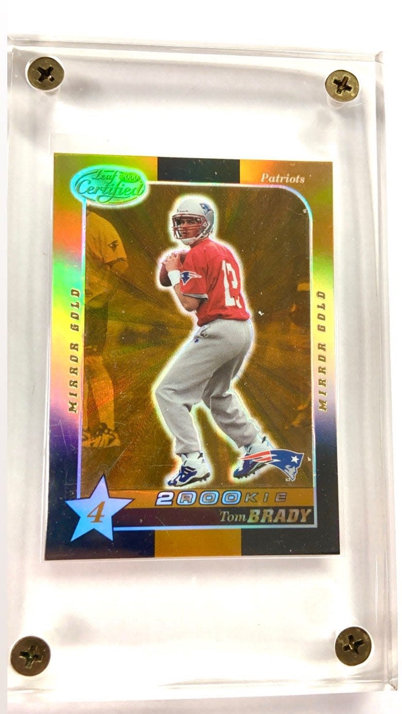 The Leaf Mirror Gold Tom Brady rookie football card.