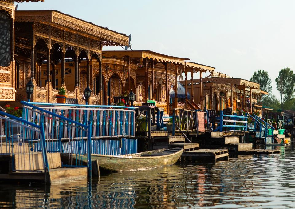 Hand-carved houseboats on Dal Lake, India, in June 2023.