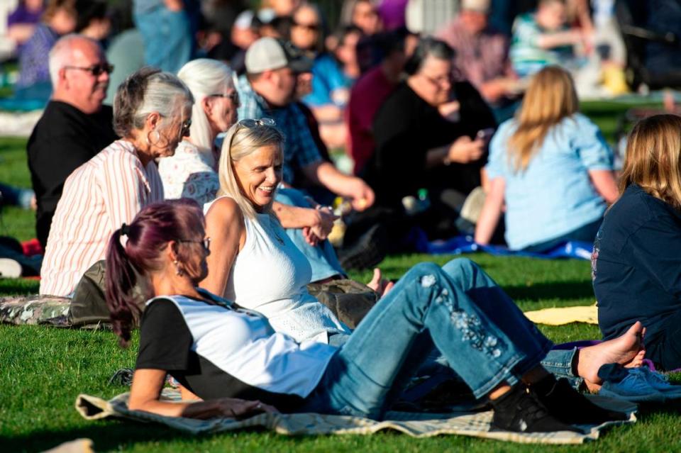 Fans relax on the lawn before the start of the KC and The Sunshine Band concert at The Sound Amphitheater in Gautier on Friday, April 12, 2024. The show marks the multi-million dollar venue’s inaugural show. Hannah Ruhoff/Sun Herald