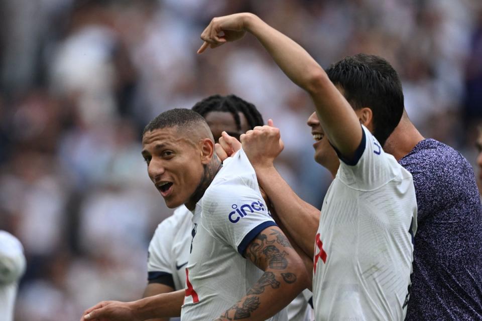 Soaking up the plaudits: Heung-min Son wanted Richarlison to feel the love from Spurs fans (AFP via Getty Images)