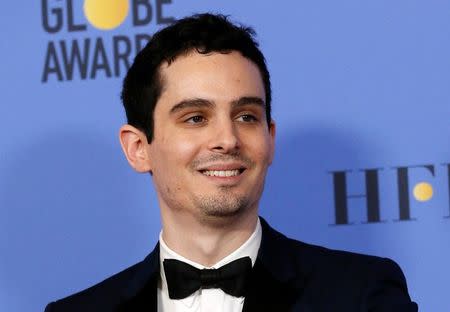 Director Damien Chazelle after winning Best Screenplay - Motion Picture for "La La Land" during the 74th Annual Golden Globe Awards in Beverly Hills, California, U.S., January 8, 2017. REUTERS/Mario Anzuoni/ File Photo