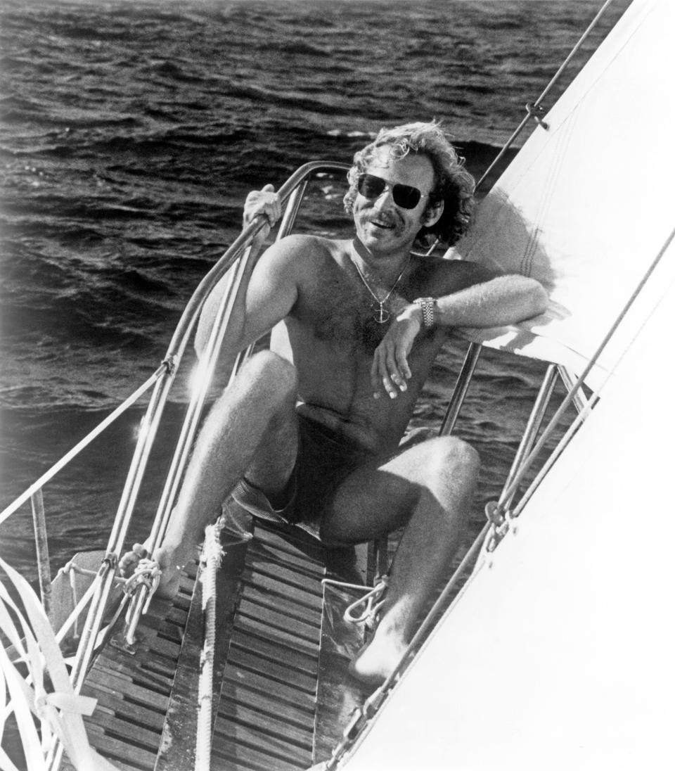 Jimmy Buffett poses for a photo in his sailboat circa 1975 in Key West, Florida.