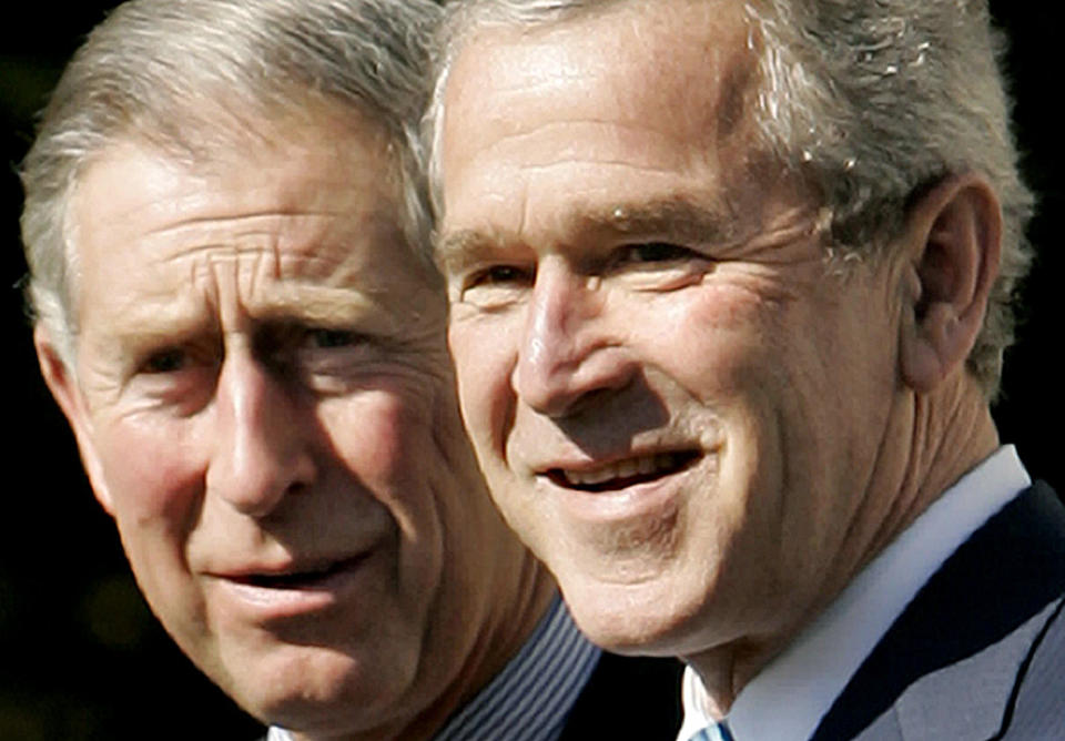 FILE - President George W. Bush poses with Britain's Prince Charles upon his arrival at the White House in Washington, Nov. 2, 2005. (AP Photo/Gerald Herbert, File)