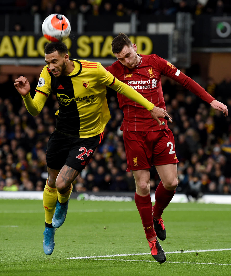 WATFORD, ENGLAND - FEBRUARY 29: (THE SUN OUT, THE SUN ON SUNDAY OUT) Etienne Capoue of Watford competing with  Andy Robertson of Liverpool during the Premier League match between Watford FC and Liverpool FC at Vicarage Road on February 29, 2020 in Watford, United Kingdom. (Photo by John Powell/Liverpool FC via Getty Images)