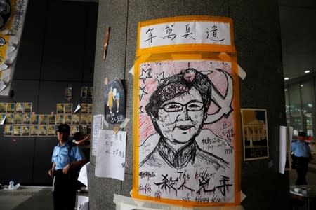 A caricature of Hong Kong leader Carrie Lam is seen on a pillar of the Legislative Council, a day after protesters broke into the building, in Hong Kong