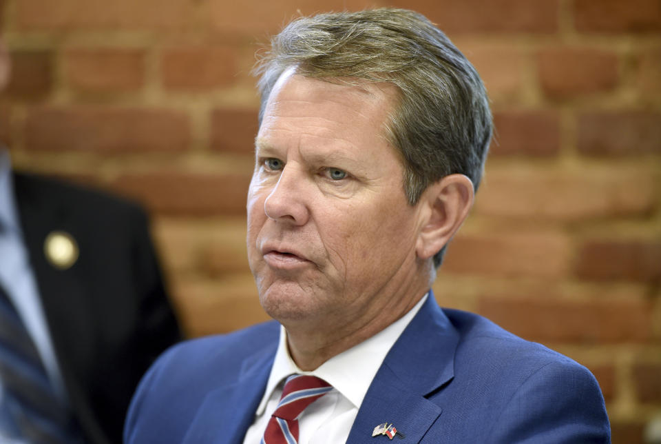 File-This July 2, 2019, file photo shows Georgia republican Governor Brian Kemp during a roundtable discussion on Georgia's healthcare challenges at Christ Community Health Center in Augusta, Ga. A federal judge on Tuesday, Oct. 1, 2019, temporarily blocked Georgia’s restrictive new abortion law from taking effect, following the lead of other judges who have blocked similar measures in other states. The law signed in May by Kemp bans abortions once a fetal heartbeat is detected, which can happen as early as six weeks into a pregnancy, before many women realize they’re expecting. It allows for limited exceptions. (Michael Holahan/The Augusta Chronicle via AP, File)