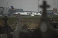 A Ryanair passenger plane rests idle during a Ryanair employees strike at the Charleroi airport, outside Brussels, Friday, Sept. 28, 2018. Ryanair pilots and cabin crew went on strike forcing the cancellation of some 250 flights across Europe, including Spain, Portugal, Belgium, the Netherlands, Italy and Germany.(AP Photo/Francisco Seco)