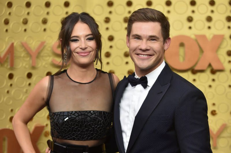 Adam Devine (R) and Chloe Bridges attend the Primetime Emmy Awards in 2019. File Photo by Christine Chew/UPI