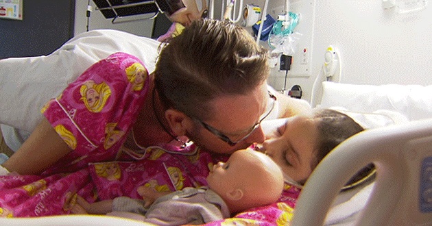 Sienna and her father Shane in hospital.