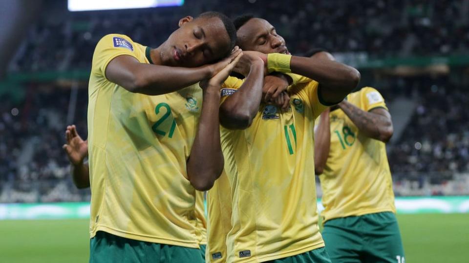 South African players celebrate after scoring during the international friendly soccer match between Algeria and South Africa in Algiers, Algeria on March 26, 2024.