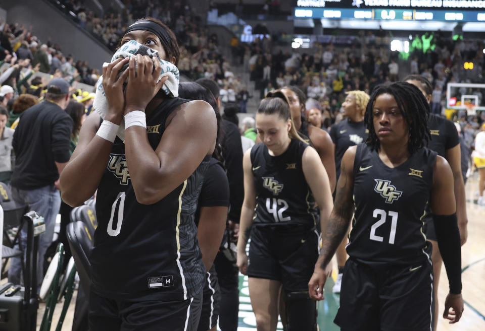 Central Florida guard Laila Jewett, left, reacts after a loss to Baylor in an NCAA college basketball game, Saturday, Jan. 20, 2024, in Waco, Texas. (Rod Aydelotte/Waco Tribune-Herald via AP)