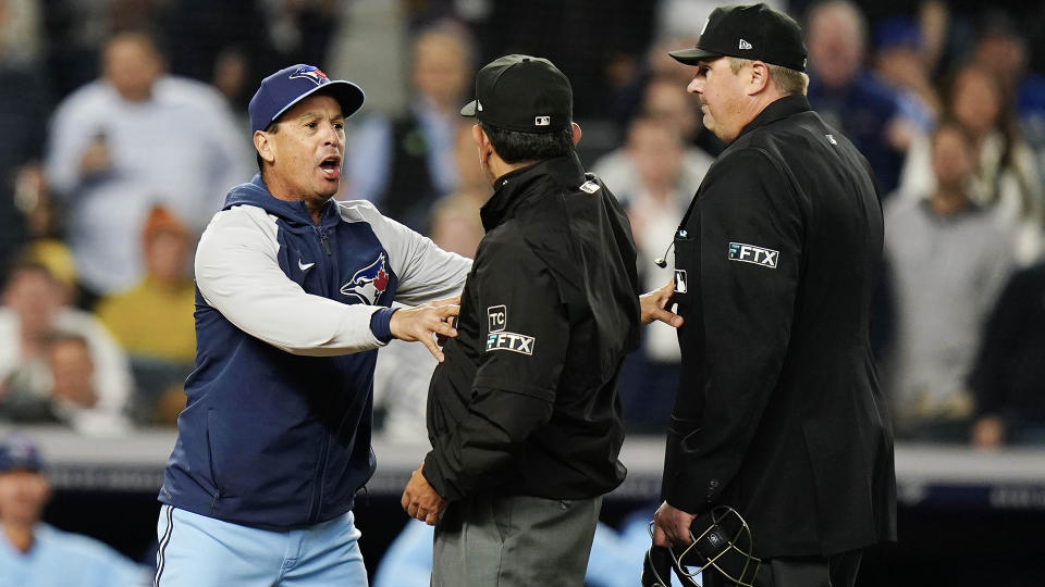Charlie Montoyo, left, Peter Walker and Yimi Garcia were all thrown out of Tuesday's Blue Jays vs. Yankees game. (AP Photo/Frank Franklin II)
