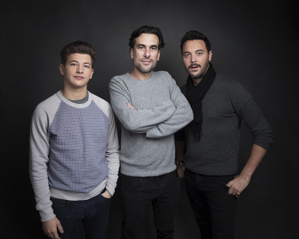 Actor Tye Sheridan, from left, director Alexandre Moors and actor Jack Huston pose for a portrait to promote the film, "The Yellow Birds", at the Music Lodge during the Sundance Film Festival on Sunday, Jan. 22, 2017, in Park City, Utah. (Photo by Taylor Jewell/Invision/AP)