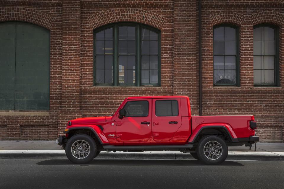 <p>Sure, it might have the face and same general styling as the Wrangler, but <a href="https://www.roadandtrack.com/new-cars/first-drives/a26990133/the-2020-jeep-gladiator-is-everything-you-want-in-a-wrangler-pickup-truck/" rel="nofollow noopener" target="_blank" data-ylk="slk:the Gladiator;elm:context_link;itc:0;sec:content-canvas" class="link ">the Gladiator</a> has some serious upgrades that set it apart from its non-pickup-bed sibling. The suspension and frame have been beefed up for towing, and the wheelbase is longer. Thankfully, it can still handle an off-road course with no trouble. <a href="https://www.ebay.com/itm/2020-Jeep-Gladiator-Sport-4WD-V6-SUV-Backup-Camera-USB-AUX-Bluetooth-UConnect/313071640399?hash=item48e4861f4f:g:vS0AAOSweaRer1x0" rel="nofollow noopener" target="_blank" data-ylk="slk:Here's a brand-new one;elm:context_link;itc:0;sec:content-canvas" class="link ">Here's a brand-new one</a> with a manual transmission you can own today. </p>