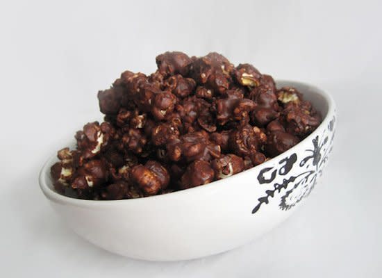 <strong>Get the <a href="http://naturallysweetrecipes.blogspot.com/2012/02/poppy-chow-peanut-butter-chocolate.html" target="_hplink">Peanut Butter and Chocolate Popcorn recipe</a> by Naturally Sweet Recipes</strong>    When you combine peanut butter and chocolate, people get excited. And when you use it to top popcorn, it makes a snack that's hard to resist. 