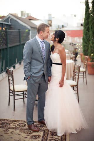 <p>Courtesy of Avni Shah/ InStyle</p> Avni with her husband Andy on their wedding day in 2012. The reception dress was custom made in LA’s Koreatown.