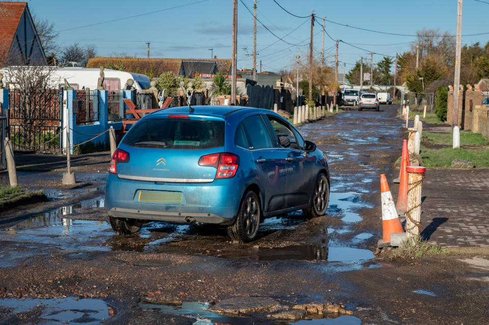 Local residents claim the road has damaged their cars. (SWNS)