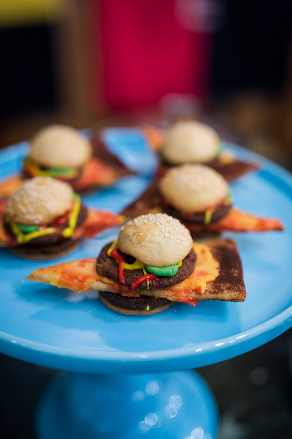 And in more adventures in party food, Warby Parker served these pizza cheeseburger cookies by Breanne Butler at its party in NYC celebrating illustrator Jason Polan and his new book, “Every Person in New York.” Curious about the cookie? Pickle is marshmallow fondant and the condiments are royal icing.“