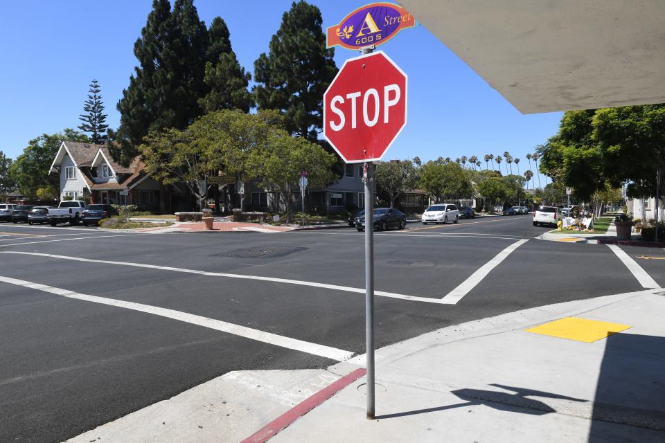 Stop signs stand at all four corners of the downtown Oxnard intersection where Supervisor Carmen Ramirez was fatally struck by a truck at A and Seventh streets in August.