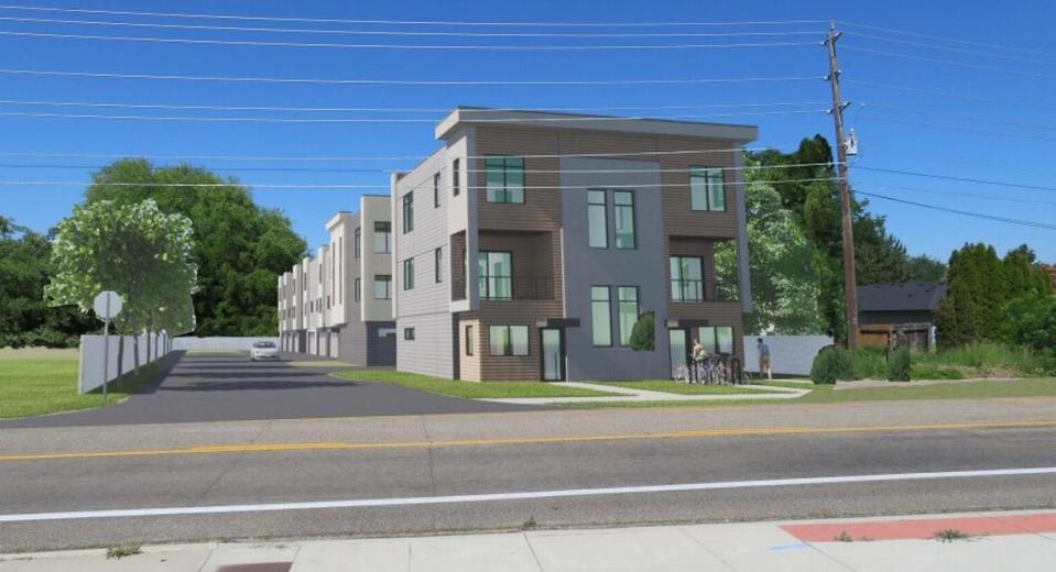 A rendering depicts the proposed Maple Grove Townhomes.