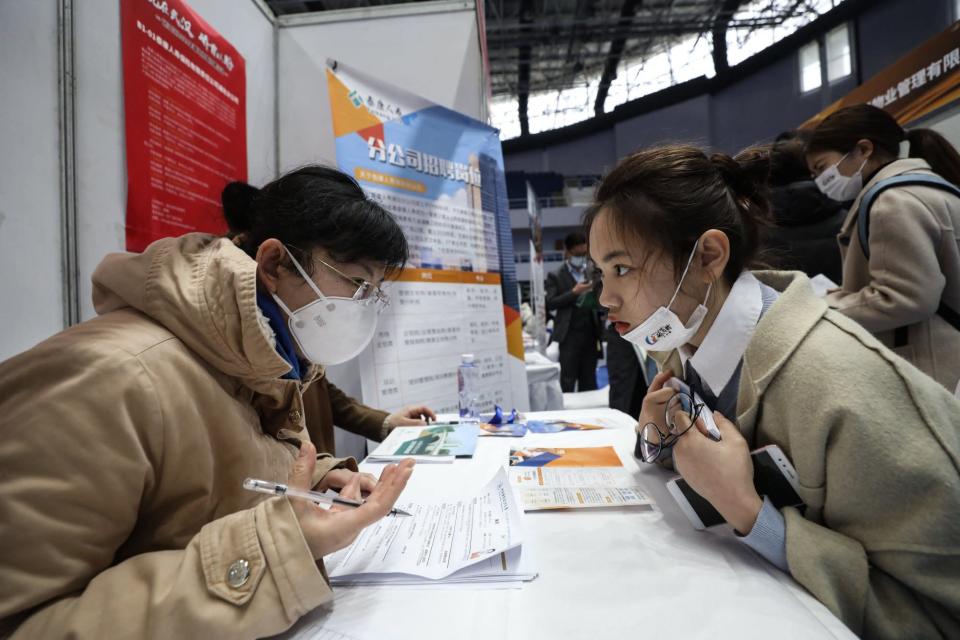 Job prospects have become so dire that some Chinese universities have taken to begging former students to help new graduates find work. Photo: AFP