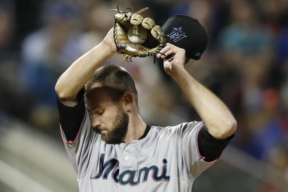 Miami Marlins relief pitcher Josh Smith reacts after hitting New York Mets' Jeff McNeil with a pitch during the sixth inning of a baseball game Wednesday, Sept. 25, 2019, in New York. McNeil left the game after he was hit. (AP Photo/Kathy Willens)