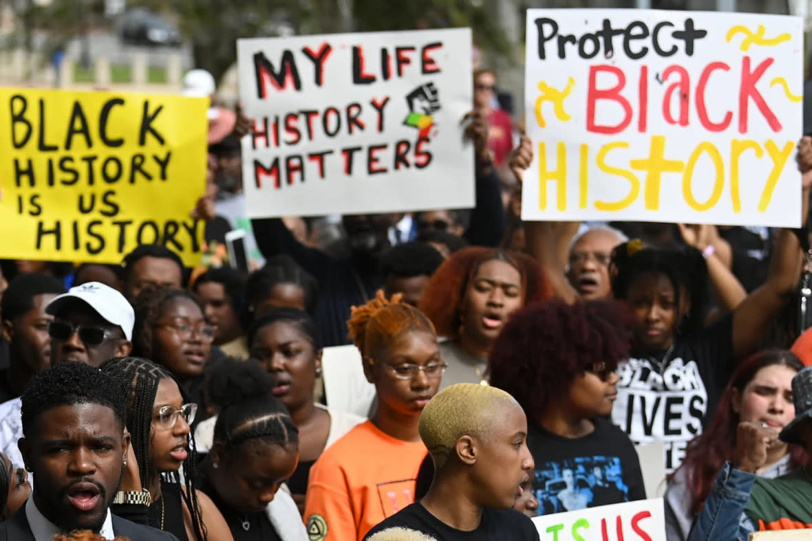 Demonstrators protest Florida Gov. Ron DeSantis’ plan to eliminate Advanced Placement courses on African American studies in high schools as they stand outside the Florida State Capitol on Feb. 15, 2023, in Tallahassee, Florida. (Photo by Joshua Lott/THE WASHINGTON POST VIA GETTY IMAGES)