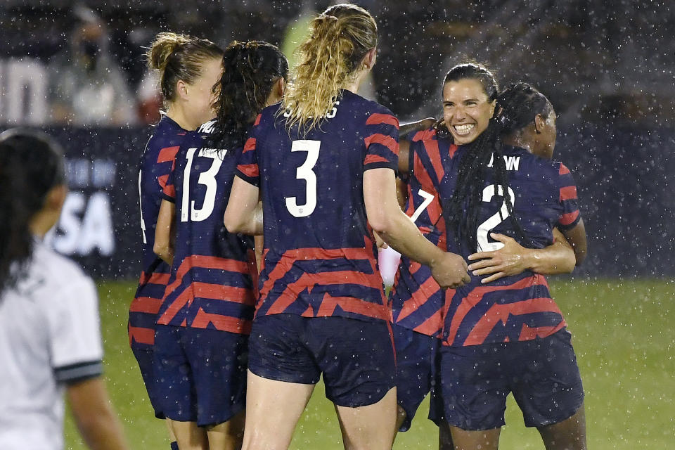 United States' Tobin Heath, second from right, celebrates her goal with teammates during the second half of an international friendly soccer match against Mexico, Thursday, July 1, 2021, in East Hartford, Conn. (AP Photo/Jessica Hill)
