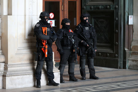 Belgian police special unit officers secure the Palace of Justice during the trial of Mehdi Nemmouche and Nacer Bendrer in Brussels, Belgium March 11, 2019. REUTERS/Yves Herman