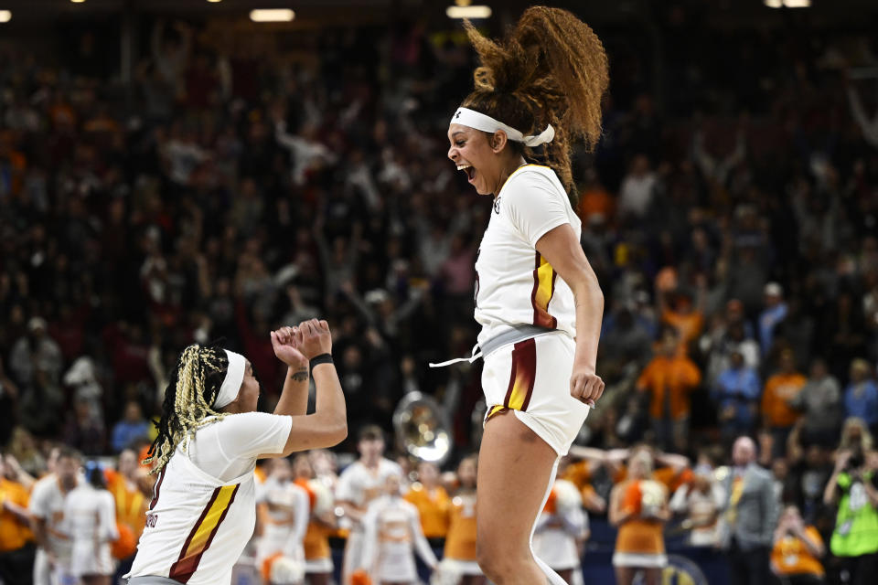 GREENVILLE, SOUTH CAROLINA - MARCH 09: Kamilla Cardoso #10 of the South Carolina Gamecocks celebrates with Te-Hina Paopao #0 after her buzzer beater three point basket to win their game against the Tennessee Lady Vols during the semifinals of the SEC Women's Basketball Tournament at Bon Secours Wellness Arena on March 09, 2024 in Greenville, South Carolina.  (Photo by Eakin Howard/Getty Images)