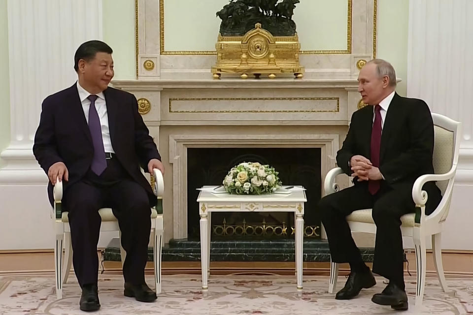 This grab from a pool footage provided by VGTRK on March 20, 2023 shows Russian President Vladimir Putin meeting with China's President Xi Jinping at the Kremlin in Moscow.