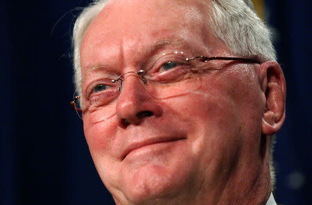 FILE PHOTO - Sen. Jim Bunning (R-KY), a Hall of Fame pitcher, smiles as he talks about progress made by Major League Baseball in dealing with steroids in Washington November 15, 2005. REUTERS/Jonathan Ernst/File Photo