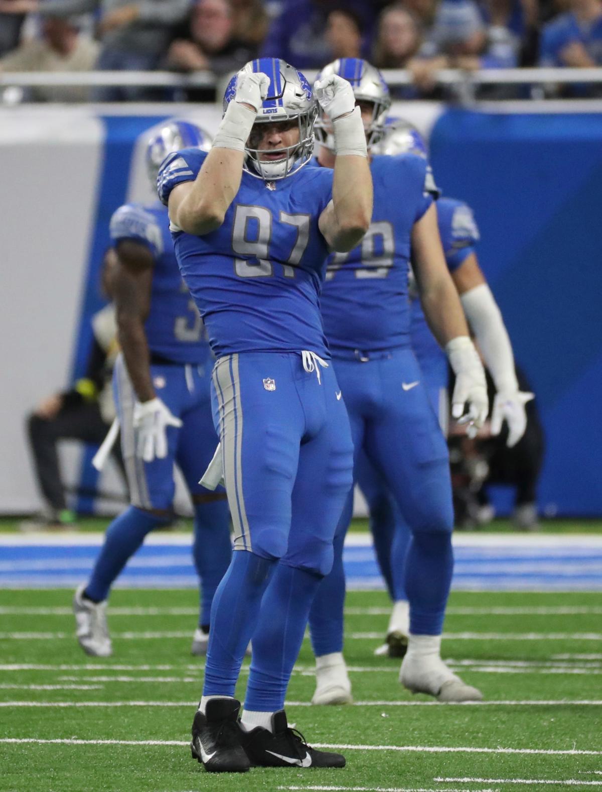 Detroit Lions head coach Dan Campbell and rookie Aidan Hutchinson