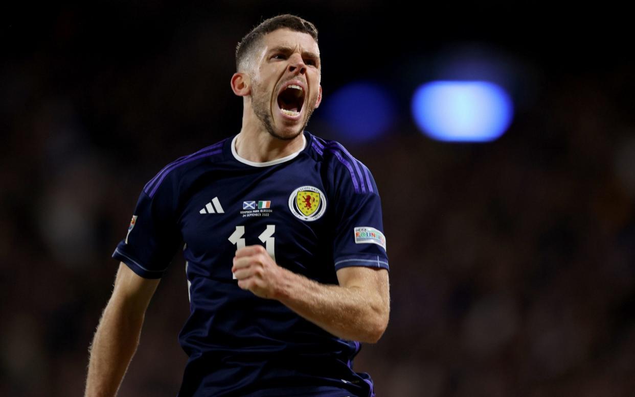 Ryan Christie celebrates scoring what proved to be the winning goal at Hampden Park  - PA