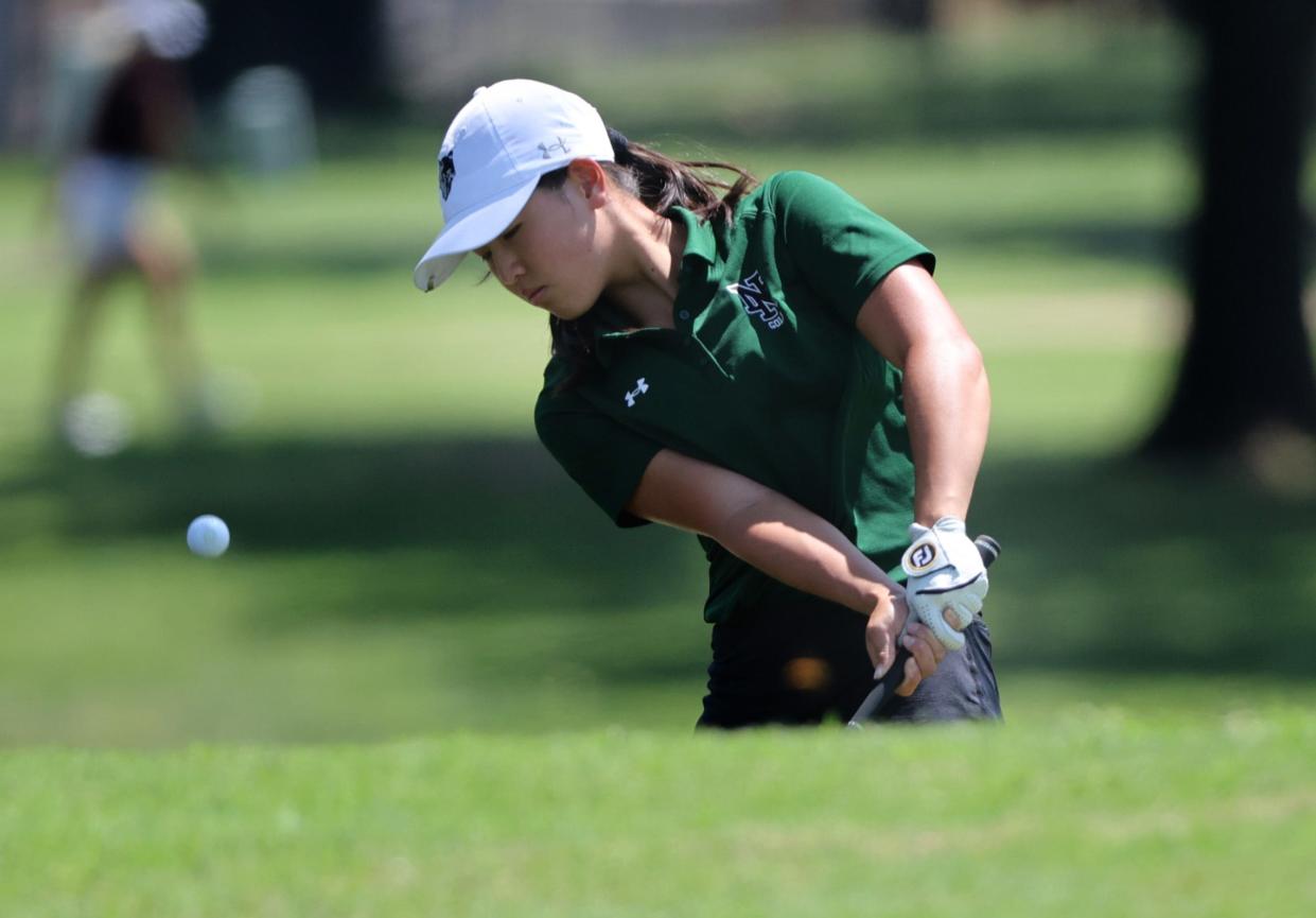 Norman North's Juliana Hong hits on the 18th hole during the Class 6A girls golf state championship at Stillwater Country Club in Stillwater, Okla., Tuesday, April 30, 2024.