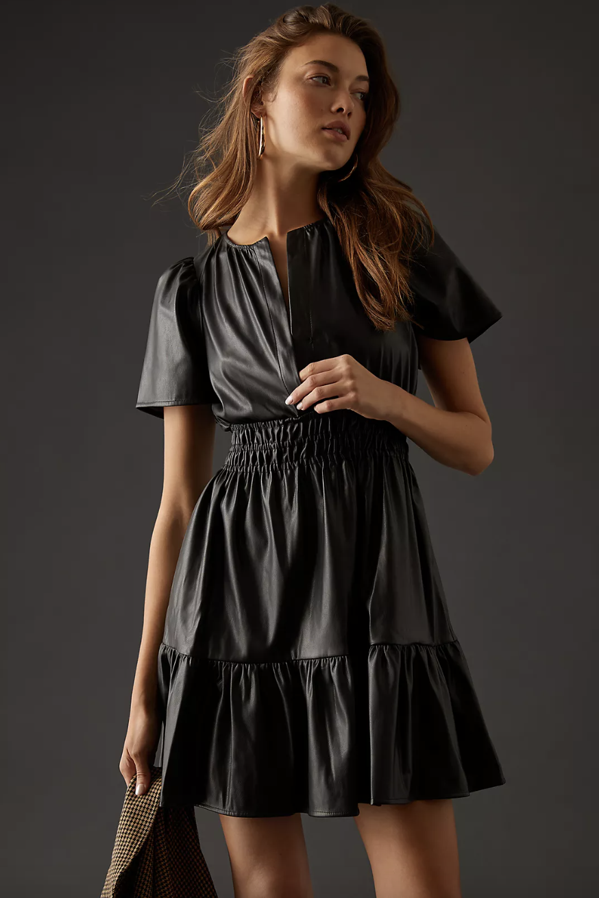 The Somerset Mini Dress: Faux Leather Edition in black (Photo via Anthropologie)