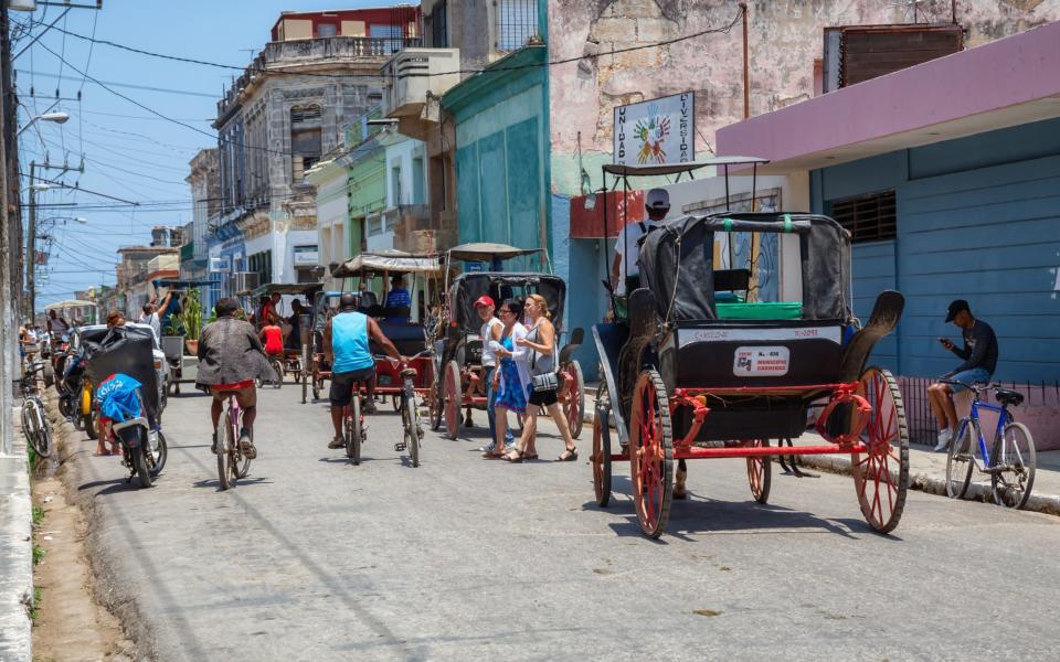 The worn pastels of Varadero town roast under the sun