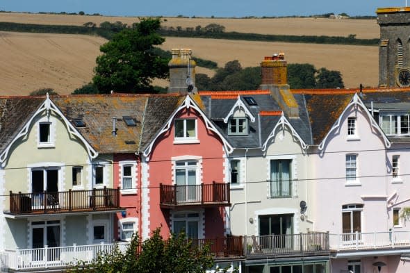 Houses and the church in Salcombe, Devon, England