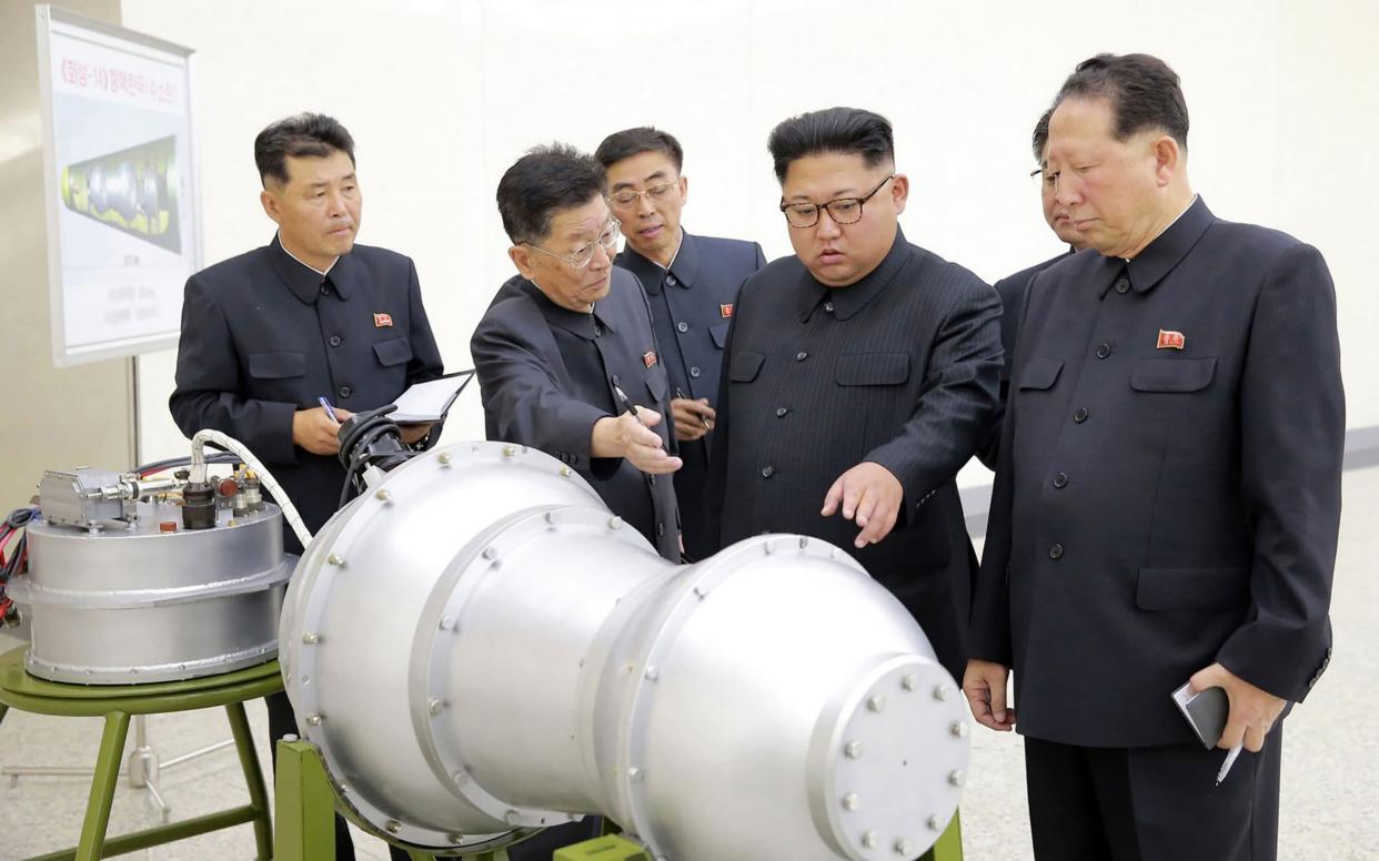 North Korean leader Kim Jong-un says they have  successfully miniaturised its nuclear weapons - AFP