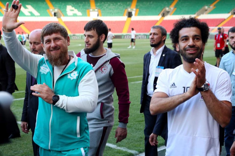 Controversial: Mohamed Salah, right, and Chechnya's regional leader, Ramzan Kadyrov, who has been accused of serious human rights infringements (AP)