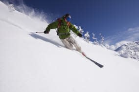 Asian man skiing