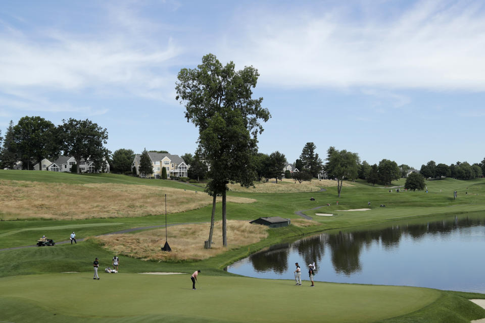 Rory McIlroy, of Northern Ireland, putts on the 16th green during the first round of the Travelers Championship golf tournament at TPC River Highlands, Thursday, June 25, 2020, in Cromwell, Conn. (AP Photo/Frank Franklin II)