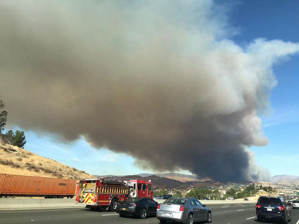 Smoke from a wind driven wild fire is seen in the hills of Canyon Country north of Los Angeles, California, U.S. October 24, 2019.       REUTERS/  Gene Blevins